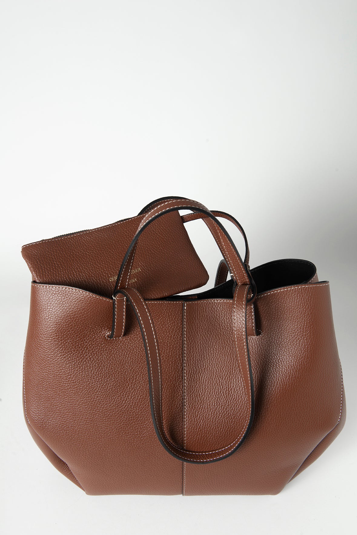 Elegant tote bag crafted from premium Italian leather, featuring a stylish, timeless design. Perfect for daily use or special occasions.