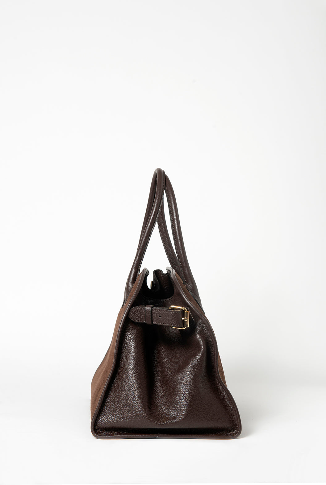 Elegant shoulder bag crafted from premium Italian leather and soft suede, featuring a stylish, timeless design. Perfect for daily use or special occasions.