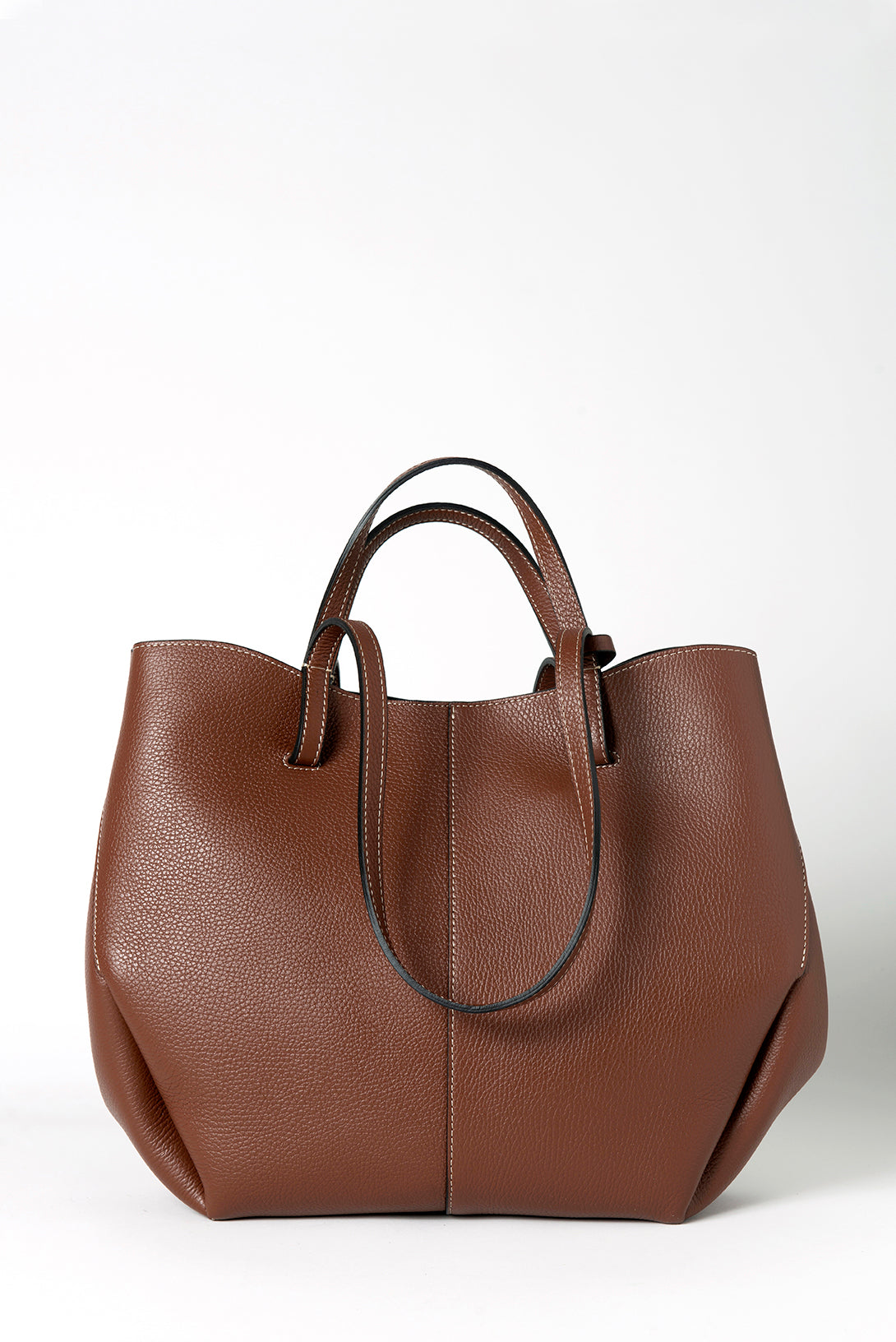 Elegant tote bag crafted from premium Italian leather, featuring a stylish, timeless design. Perfect for daily use or special occasions.