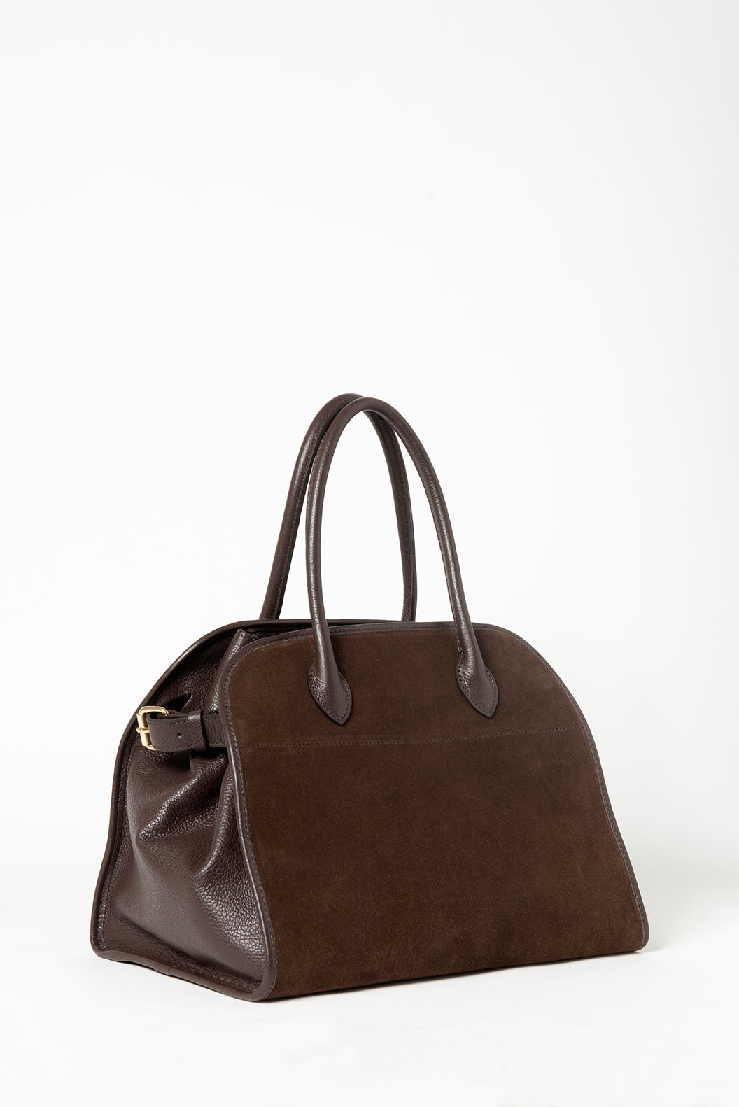 Elegant shoulder bag crafted from premium Italian leather and soft suede, featuring a stylish, timeless design. Perfect for daily use or special occasions.